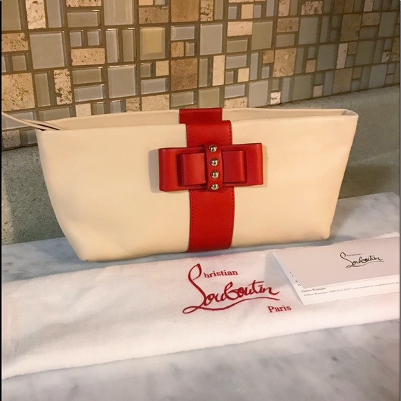 Christian Louboutin Handbags - Auth. Christian Louboutin Studded Bow Cosmetic Bag